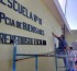 Cooperativistas realizan trabajos de pintura en la Escuela 18